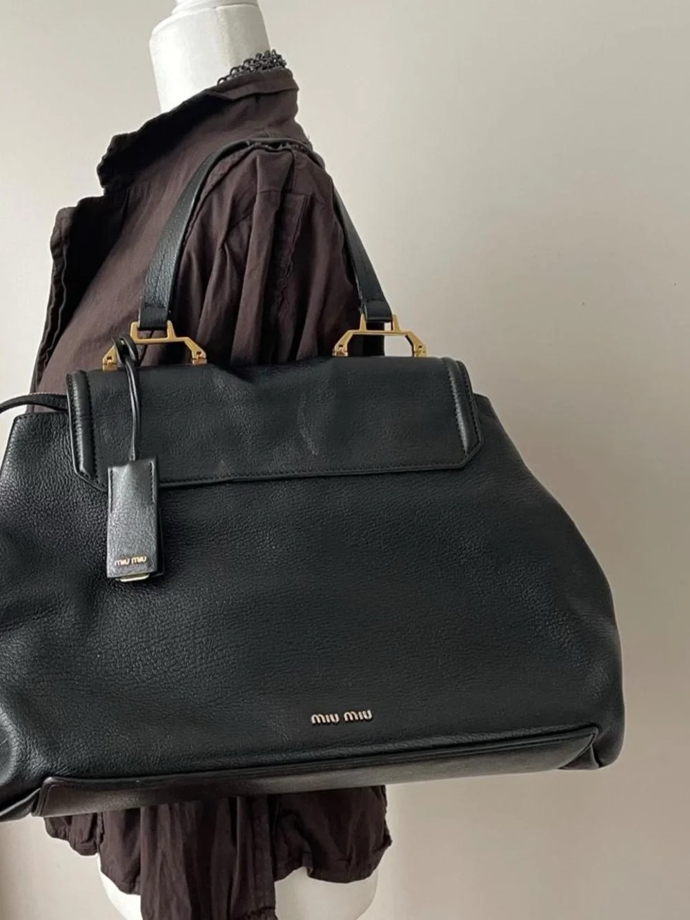 Y2K Miu Miu Black Leather Top Handle Tote with Luxury Designer Gold Accents